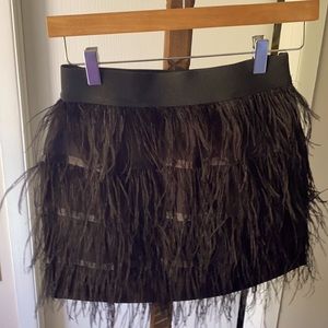 Feathered black mini skirt